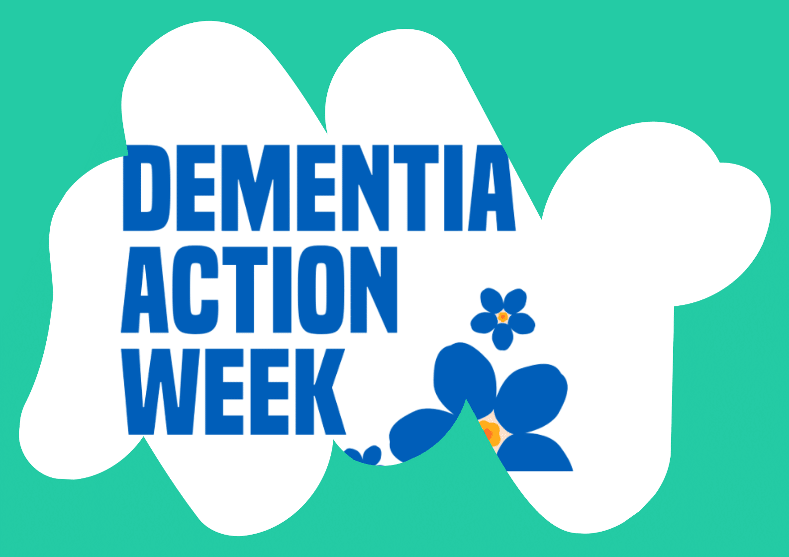 South Asian man sat talking to a care navigator in a medial consultation room