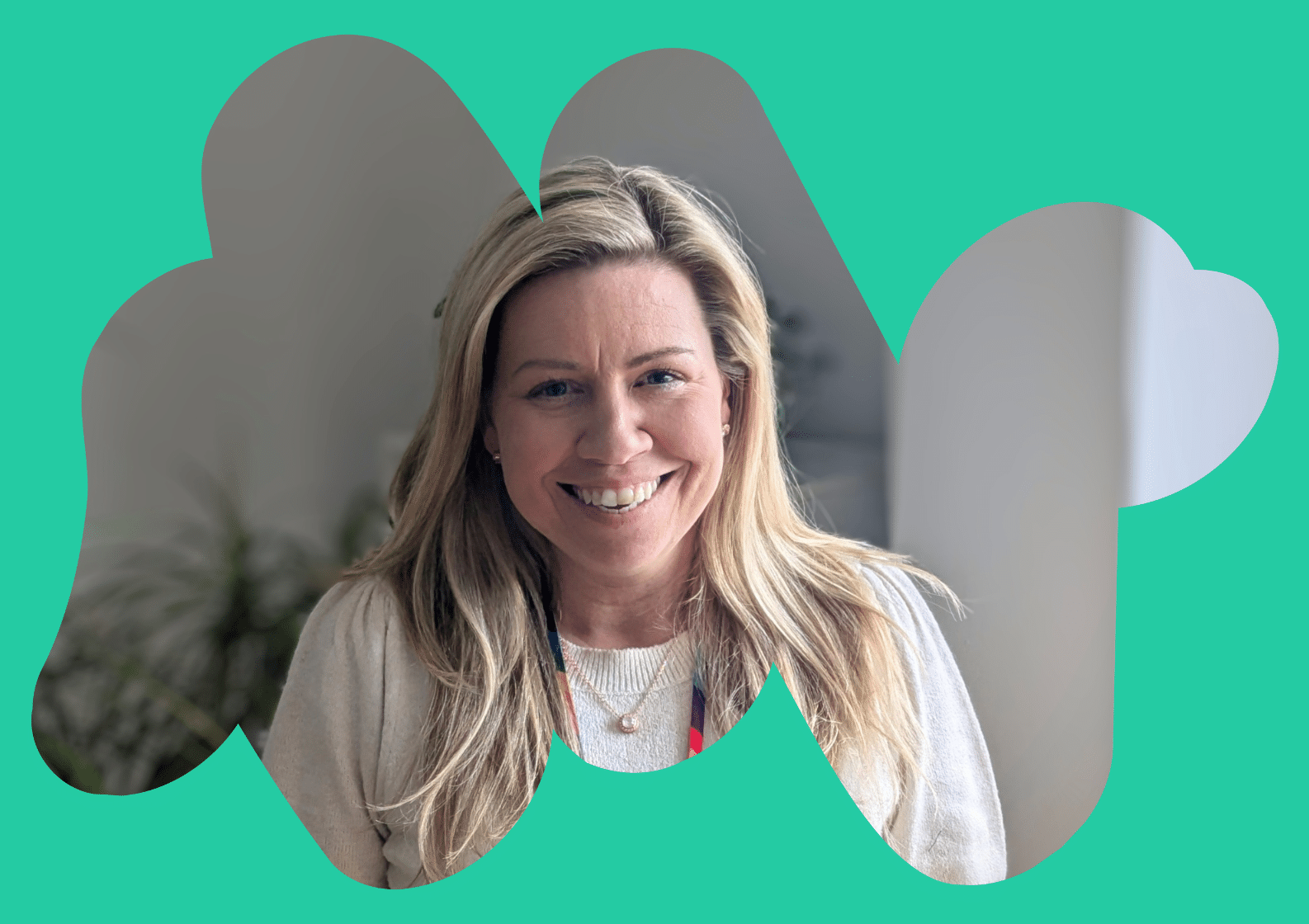 South Asian man sat talking to a care navigator in a medial consultation room