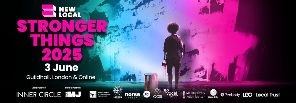 Photo of two white women outside with trees in the background. stood next to each other and smiling towards the camera. The woman on the left has long hair and the woman on the right has a short bobbed hair cut.