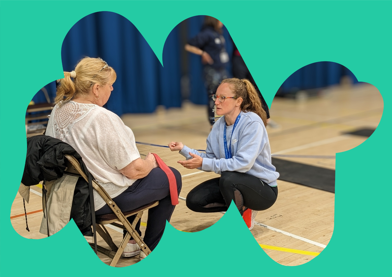 A Rethinking Our Health workshop space featuring flipcharts and whiteboards covered in colourful sticky notes. One flipchart is labelled "SOLUTIONS" with a hand-drawn lightbulb in the centre, surrounded by ideas on post-it notes. In the background, posters titled "YOUR HEALTH" and "BARRIERS" are visible, with more sticky notes and diagrams. The image is framed by an abstract teal shape.